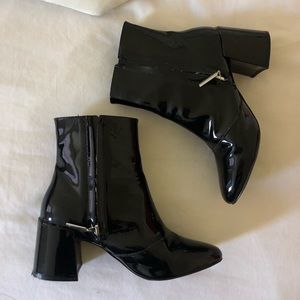 Black shiny heeled booties